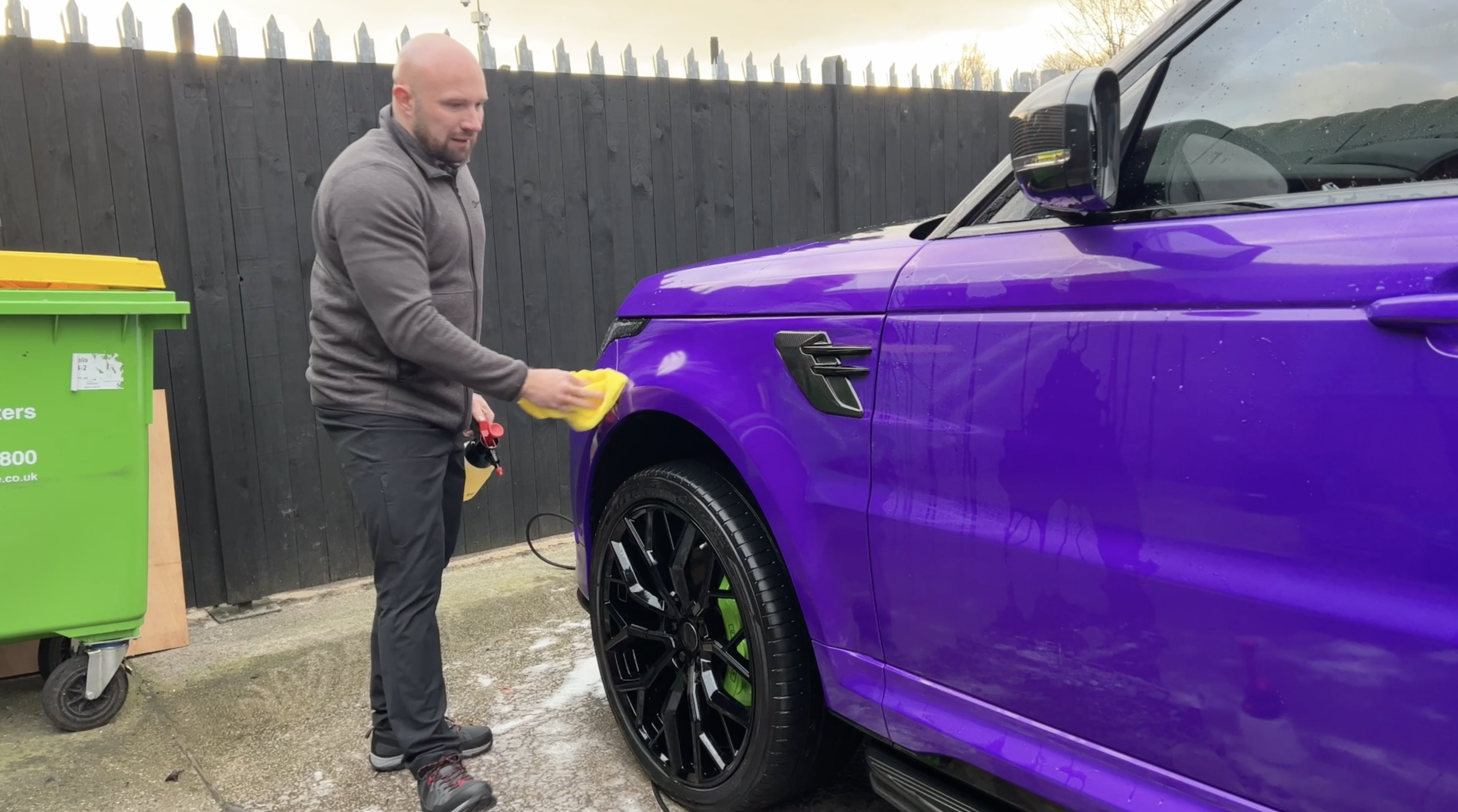Decontaminating a wrapped vehicle